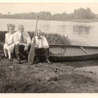 Trio on a canoe